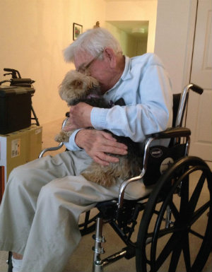 Arthur, with his beloved Yorkshire Terrier Charlie, from the third prize-winning story